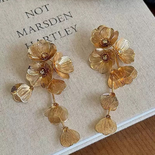 Gold leaf and flower tassel earrings