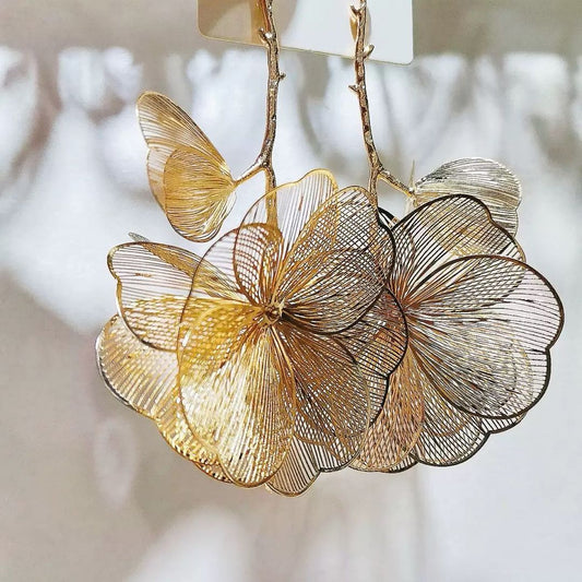 Gold openwork large leaf flower earrings